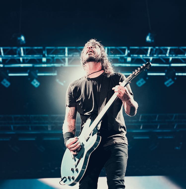 Male Guitar Player on Stage
